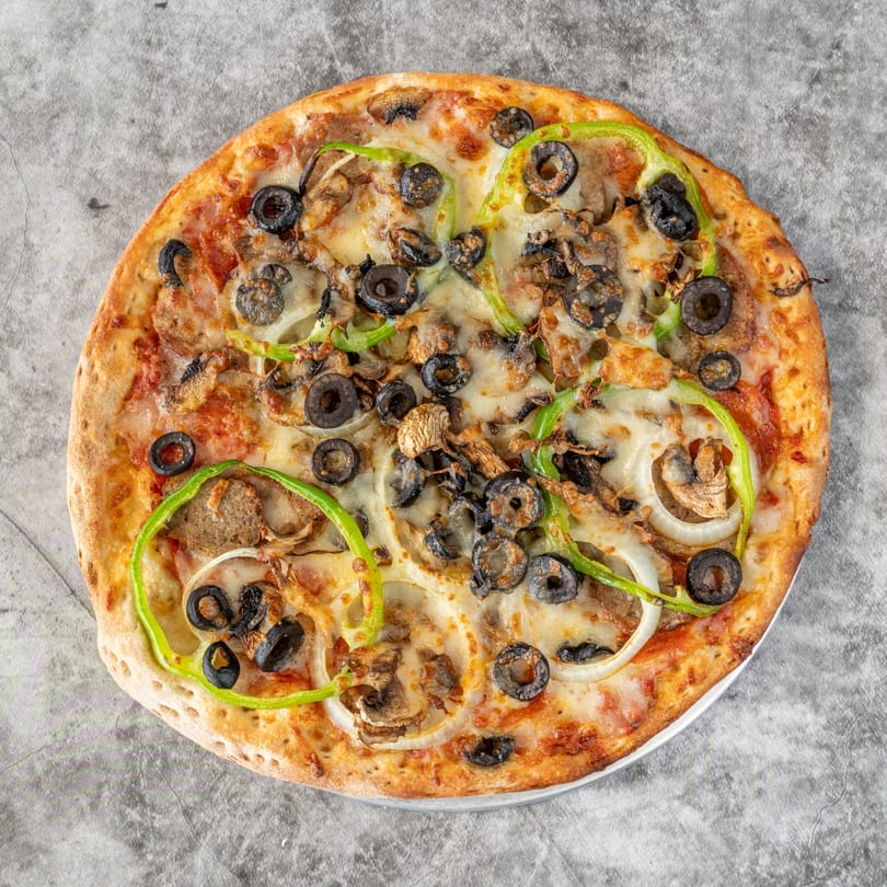 Ameci Pizza & Pasta's pizza with green peppers, black olives, onions, and mushrooms.